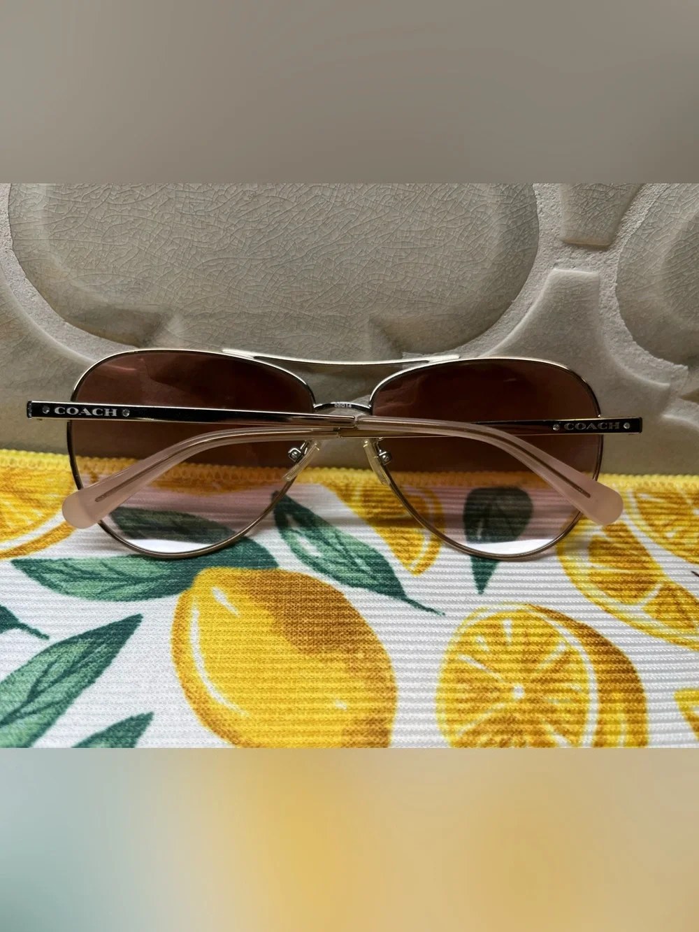 Coach Rose Gold Aviator Sunglasses with Pink Gradient Lenses